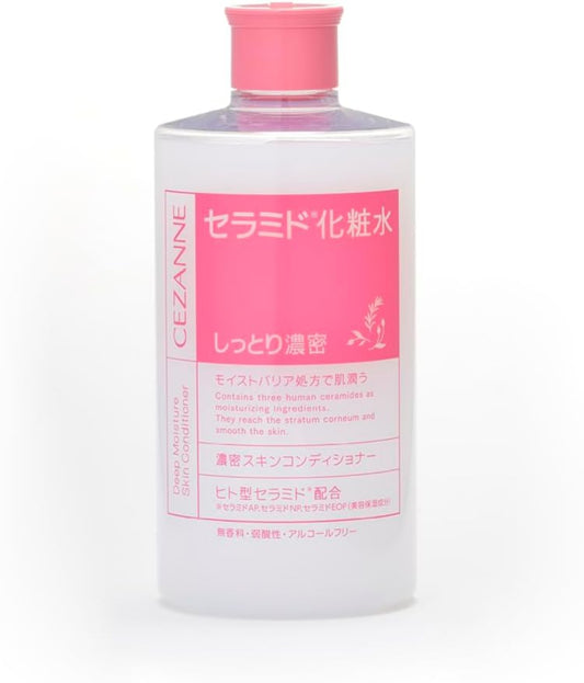 Skincare bottle with pink cap and white label on a white background
