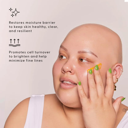 Woman applying skincare product with text about skin benefits on a light background