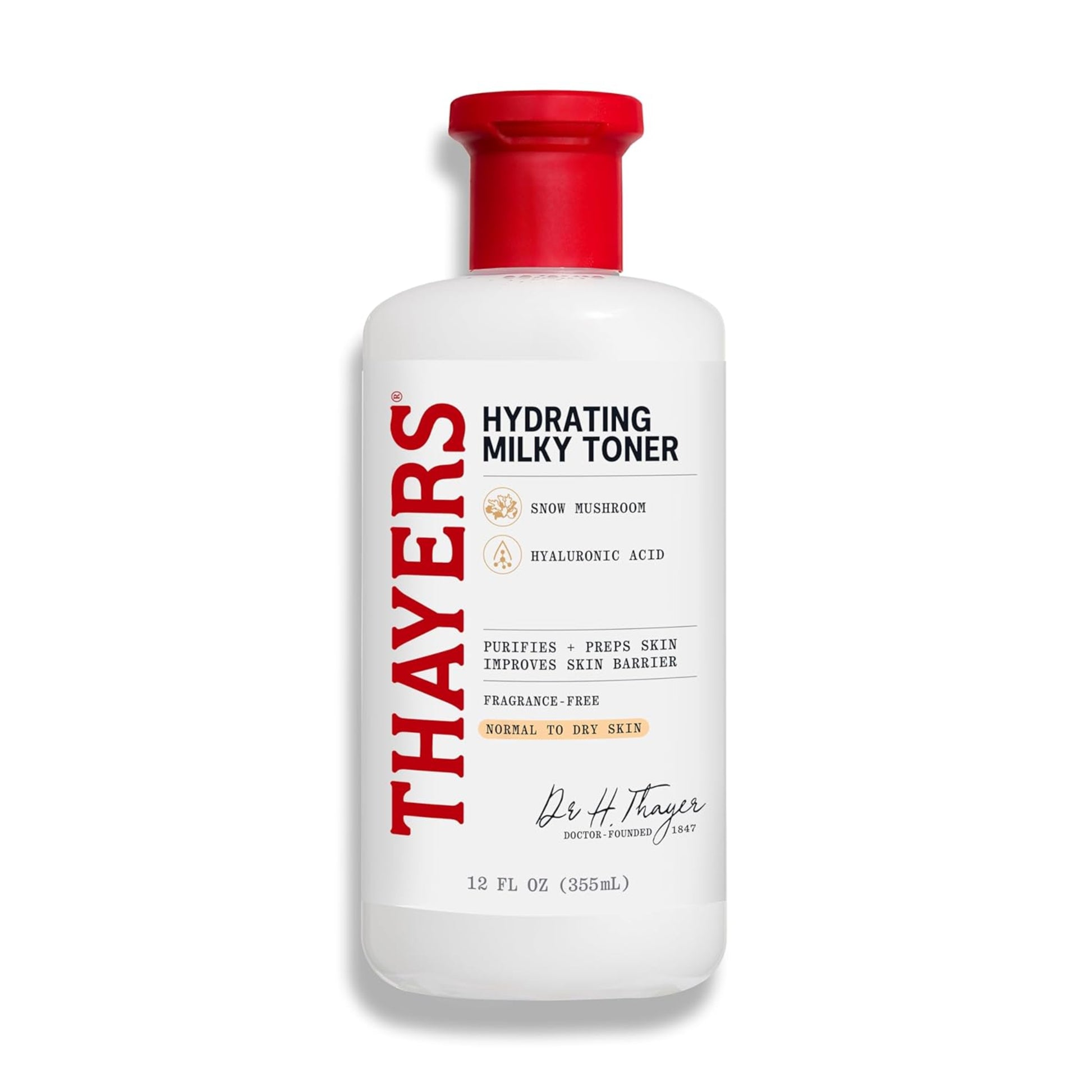 Thayer's Hydrating Milky Toner bottle with red cap on a white background