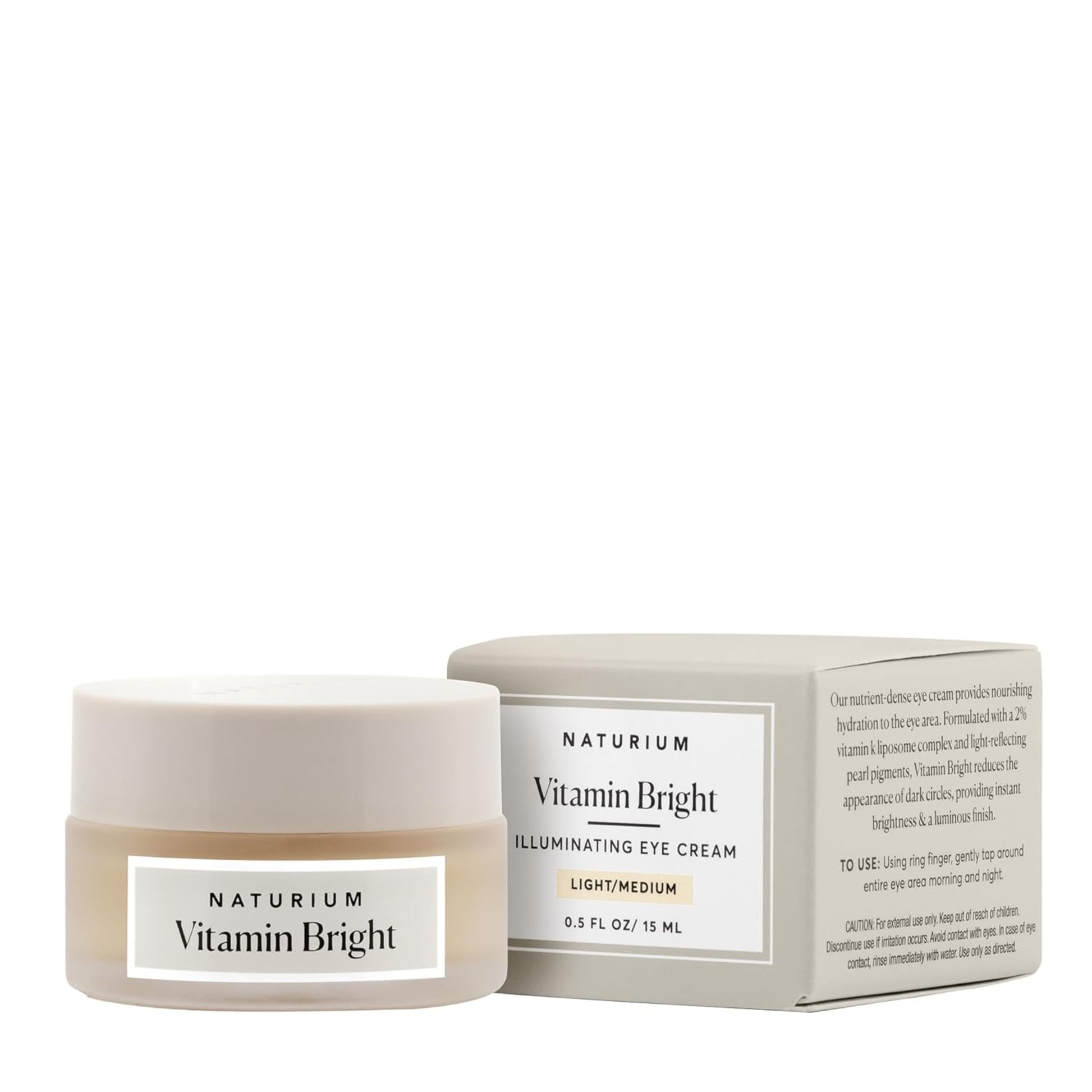 Naturium Vitamin Bright Illuminating Eye Cream jar and box on a white background