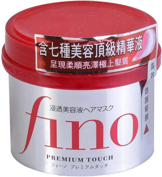 Jar of 'fino' hair mask with red lid and white label on a white background