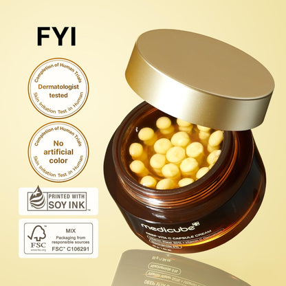 Jar of cream with capsules on a beige background, featuring 'FYI' branding and sustainability logos.