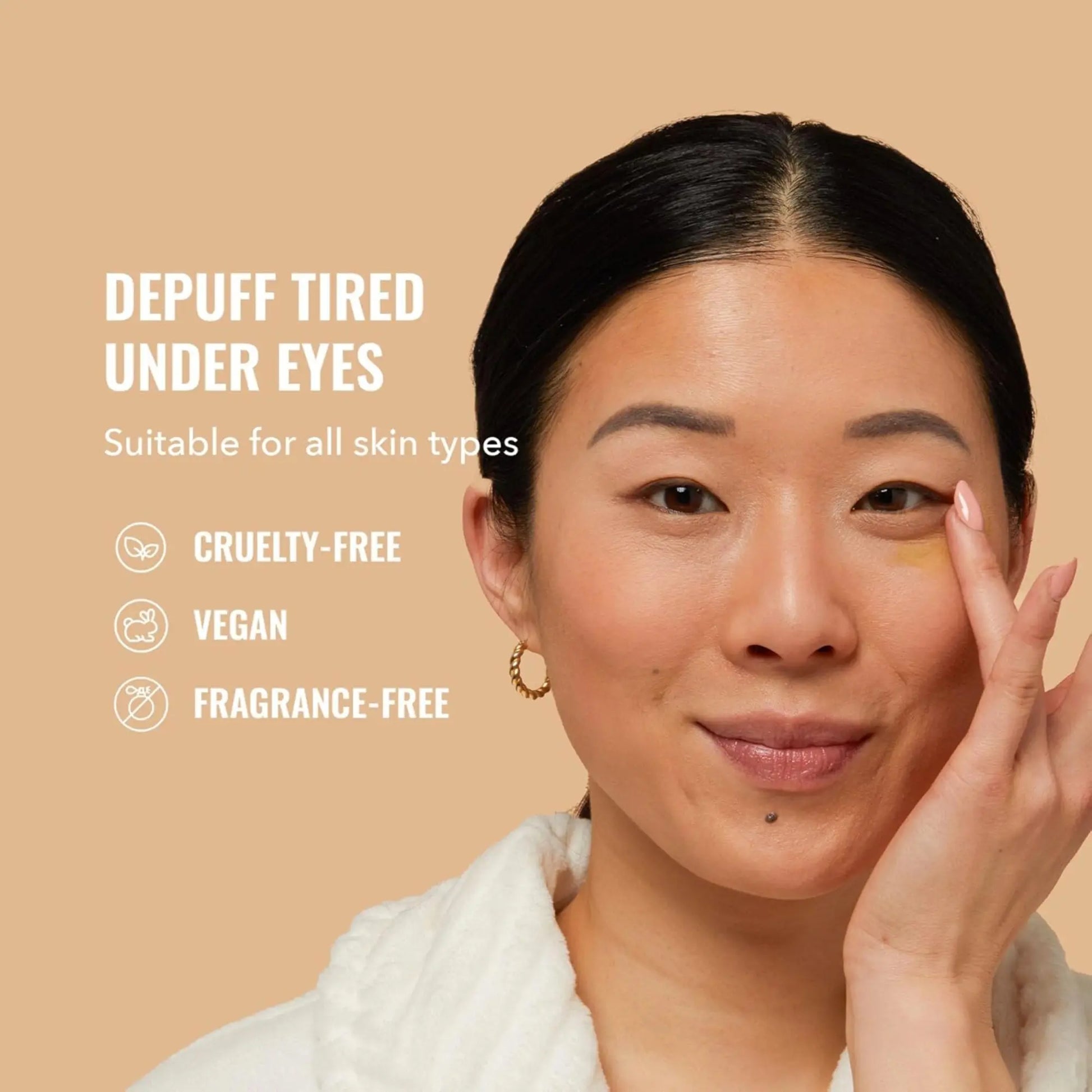 Woman applying cream under eye with product benefits listed on beige background