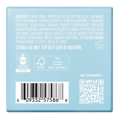 Back of a soap packaging with text, barcodes, and logos on a light blue background