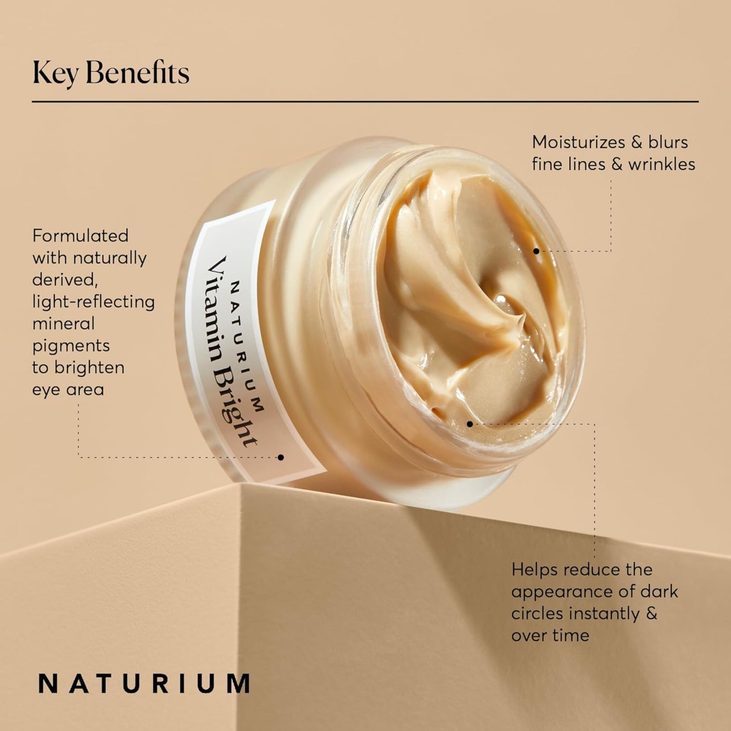 Naturium Vitamin Bright eye cream jar with key benefits text on a beige background