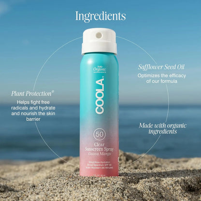 COOLA sunscreen spray bottle with beach background and text about ingredients