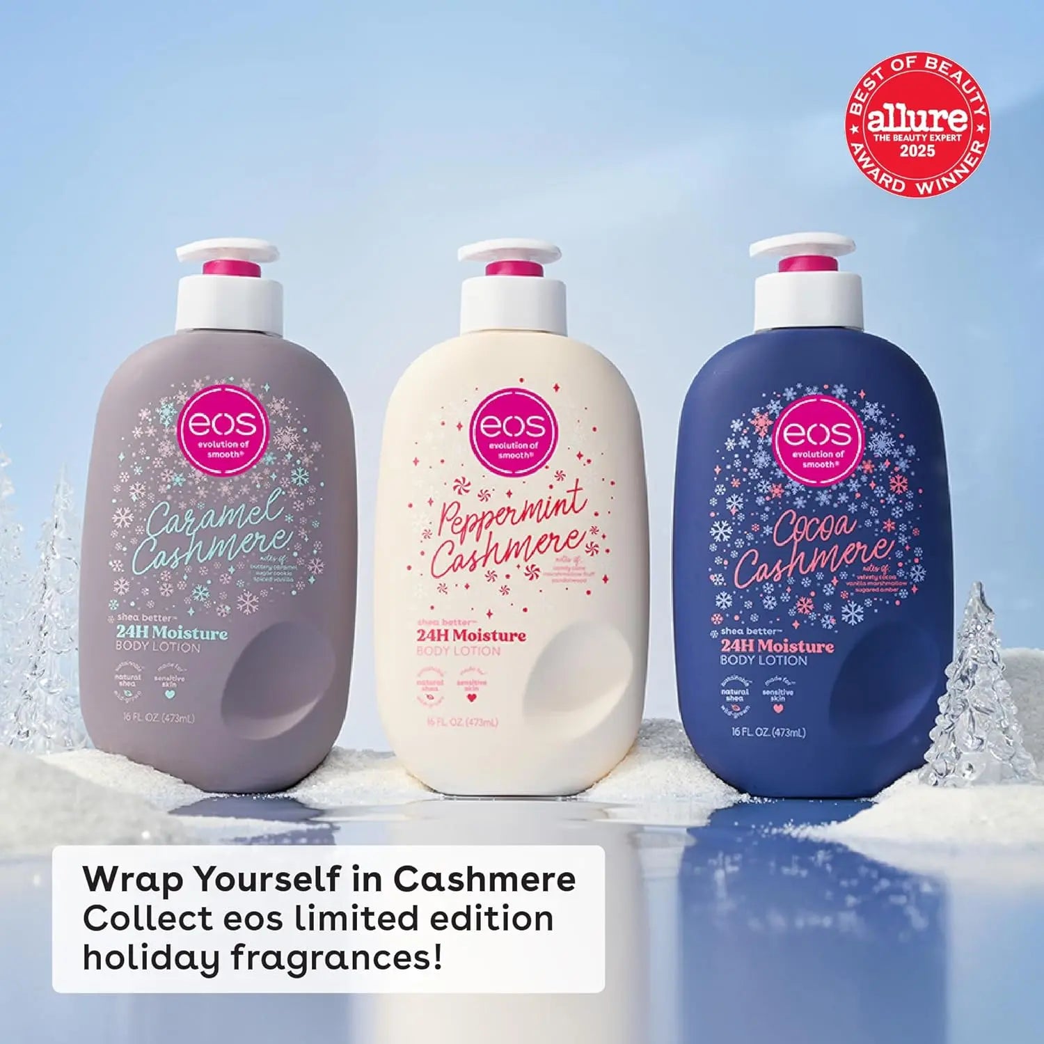 Three eos body lotion bottles with cashmere scents on a snowy background, featuring the Allure Best of Beauty award.