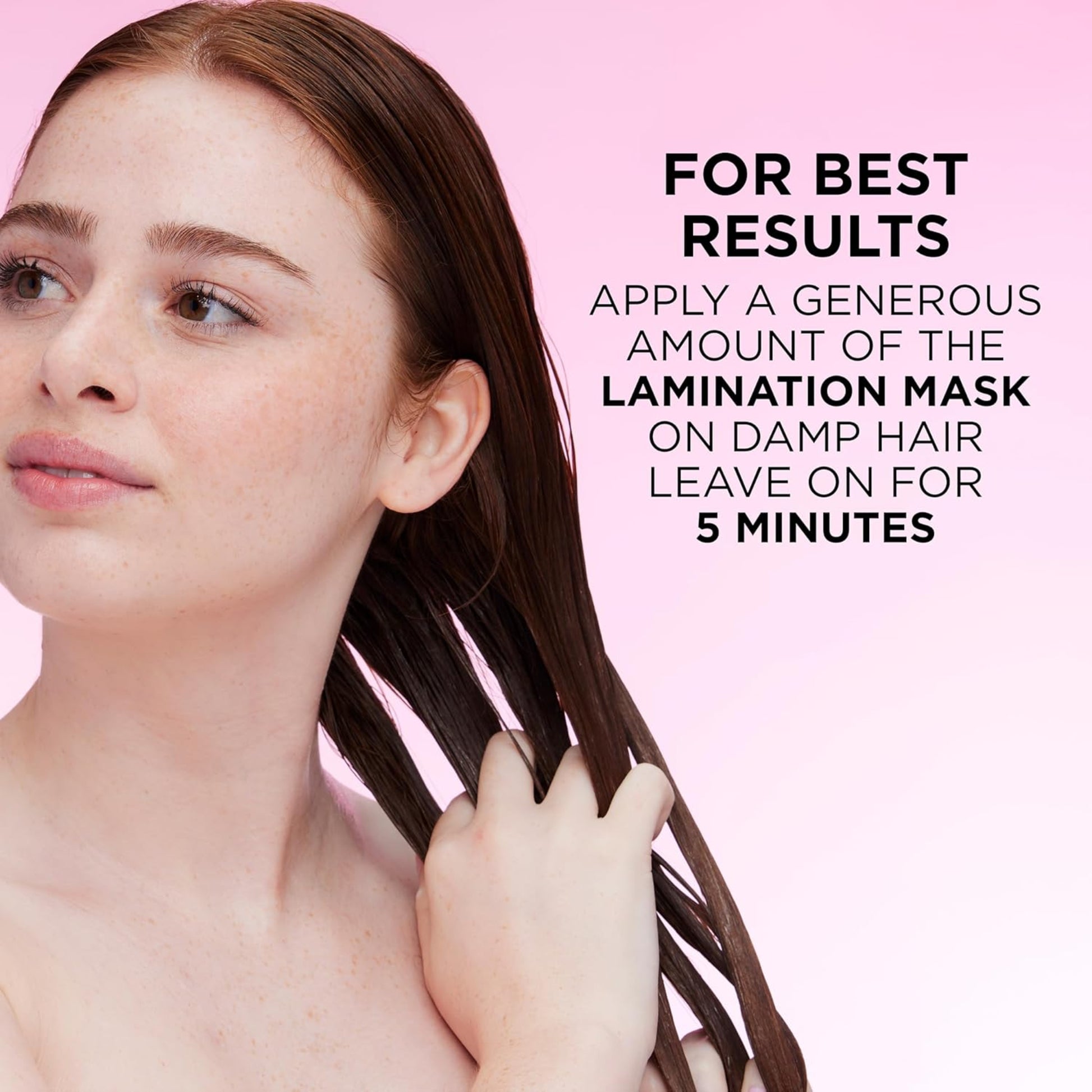 Woman applying a lamination mask to her hair with text on a pink background