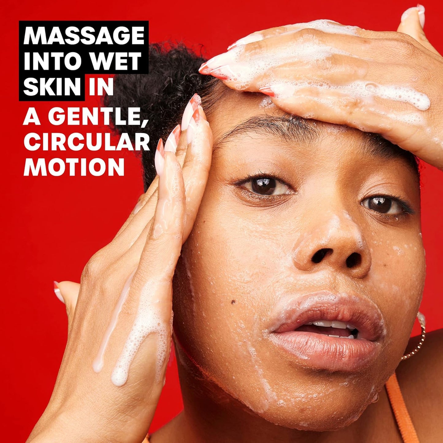 Person applying soap to their face with text on a red background