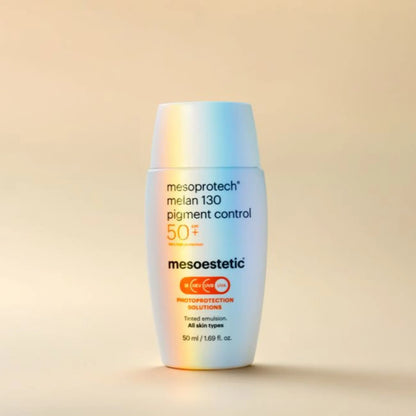 A bottle of Mesoprotech MELAN 130 Pigment Control, a tinted facial sunscreen with a colorful texture, indicated for photoprotection and regulation of melanin synthesis.