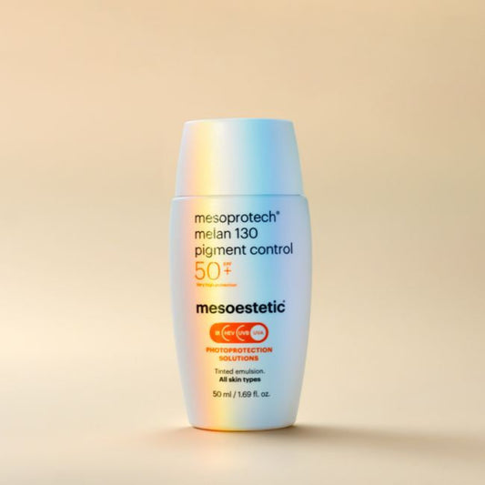 A bottle of Mesoprotech MELAN 130 Pigment Control, a tinted facial sunscreen with a colorful texture, indicated for photoprotection and regulation of melanin synthesis.
