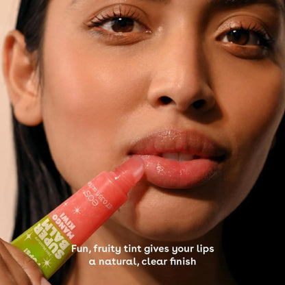 Woman applying a pink lip balm with text about its effects on lips.